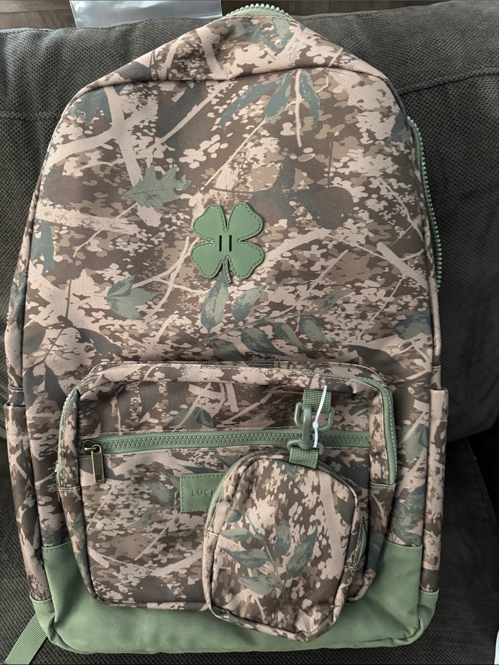 Green Camo Backpack with Four-Leaf Accent